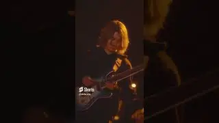 Walking and playing guitar