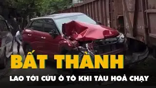 Tài xế lao tới cứu ô tô khi tàu hỏa chạy đến nhưng bất thành