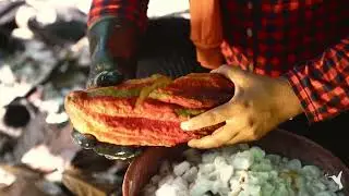 Watch Cacao Farmers Splitting Pods