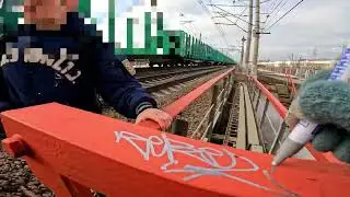 Graffiti bombing on train line. Tagging, throws and piece. Rebel813 4K 2023