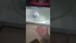 ALUMINUM FOIL BALL IN THE MICROWAVE