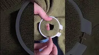 An example of darning a large hole in a sweater 