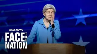 Elizabeth Warren wipes away tears after receiving standing ovation at DNC