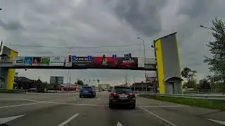 Summer driving in Ukraine: Quality road with picturesque views. Kyiv region of Ukraine.