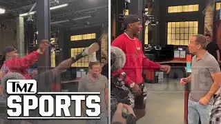 UFC Champ Israel Adesanya Kicks Cup Off Harvey Levin's Head In Wild Video | TMZ Sports