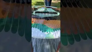 He uses a yard rake to refurbish the table!