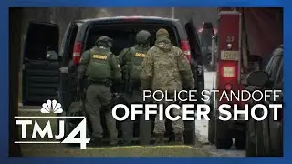 Officer shot during standoff; 4 kids rescued