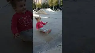 baby tries skateboard