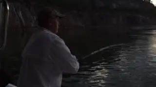 Ron Burnette with a Big Striped Bass at Carters Lake