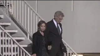 CALISTA FLOCKHART and HARRISON FORD sneak out of Hollywood Film Awards gala