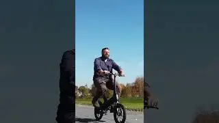 Real Men Ride Tiny Electric Motorcycles