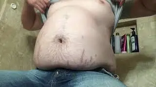 Feedee belly play in tight clothes