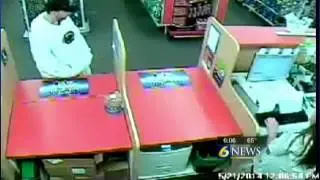 Police release video of armed robber in CVS store