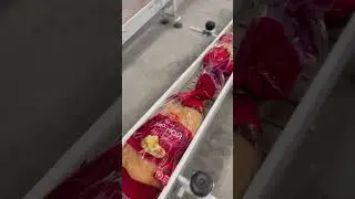 Система транспортировки упакованного хлеба
