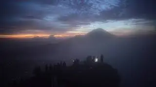 Batur night ascent. Bali sunrise on vulcano excursion