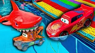 Disney Pixar Cars falling into deep pool, Lightning McQueen, Tow Mater, Mack, Sally, Francesco