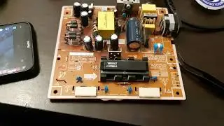Monitor switching on/off after a second. It's  NOT CAPACITORS.