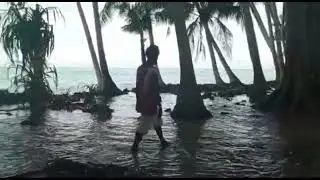 Actual footage of Piul Island being washed away.