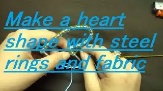 Make a heart shape with steel rings and fabric