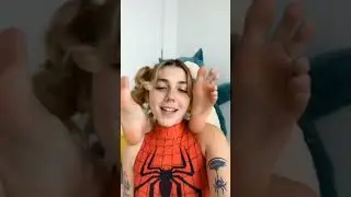 cosplayer girl shows the soles of her feet live