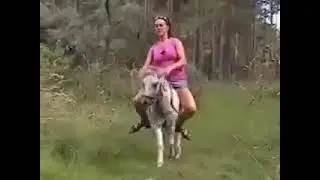 C®uel women riding horse. Part-68
