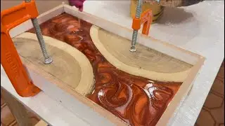 LOOK WHAT A BRILLIANT IDEA WITH TWO WOOD AND EPOXY.