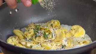 Cooking Italian Tortellini Pasta with Sauce. London Street Food