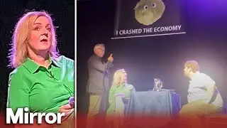 Liz Truss storms off stage after humiliating lettuce banner prank