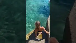 Woman Slips and Falls Into the Sea