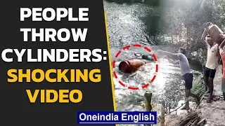 Gas Cylinder price hike: Citizens throw cylinder in the pond, video goes viral | Oneindia News