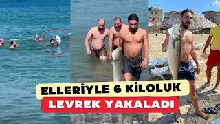 Serinlemek için girdiği denizden 6 kiloluk levreği elleriyle yakaladı