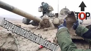 The best collection of military  heavy equipment stuck in deep mud