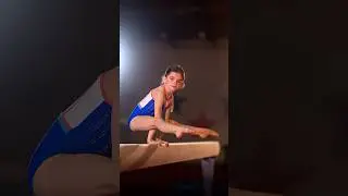 Mini gymnast on the beam 