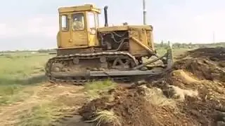 Работа бульдозера Т-130 - видео с сайта 