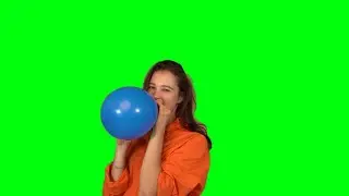 Woman Inflating a Blue Balloon Green Screen video HD footage