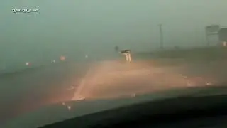 Storm chaser caught in severe weather in Hennessey, OK