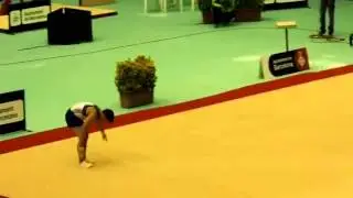 Floor exercises - Double salto piked with 1/2 twist (E)