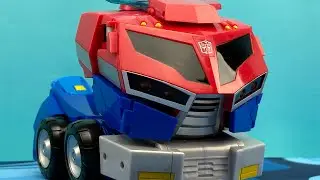 OPTIMUS PRIME TRANSFORMERS ANIMATED COMMAND AND ROLL OUT SUPREME CLASS VIDEO