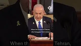 Democrat representative holds war criminal sign at Netanyahu address