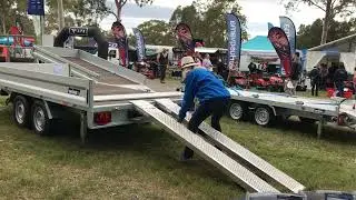 How to load ramps in trailer drawer - woman shows you.