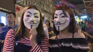 Police Block Hong Kong Party Street As Protesters Don Halloween Masks