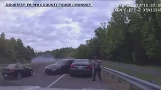 VIDEO: Officer narrowly misses being struck by out-of-control vehicle