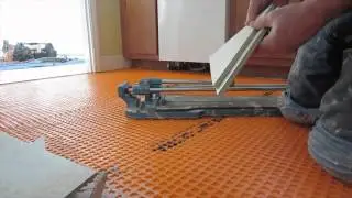 Diagonal tile floor replaced with new tile on Schluter Ditra  Part 3 Lay out, marking and cutting ti