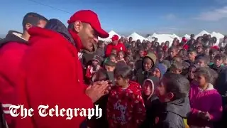 Displaced children in Gaza sing with volunteers in heartwarming moment