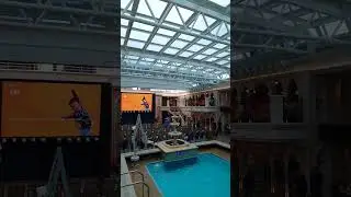 Carnival Venezia Cruise Ship roof closing - party's over - time for cold weather.