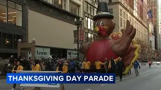 Thanksgiving Day Parade marches in downtown Chicago