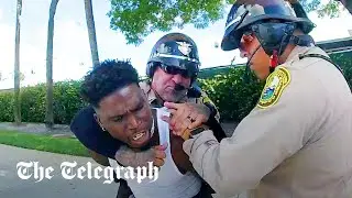 Moment NFL star Tyreek Hill dragged to ground by police