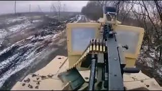 A soldier of the AZOV regiment fires from an M2 Browning machine gun at a HMMWV . | ukraine war