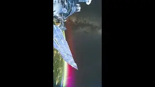 Amazing aurora glows from sunrise in space