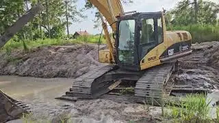 using the road pond breach to access the pond for dirt. mud mats for sure.